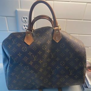 Louis Vuitton speedy with “L” small hot stamp